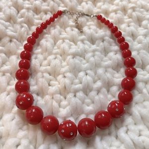 Vintage red beaded necklace with rhinestone detail